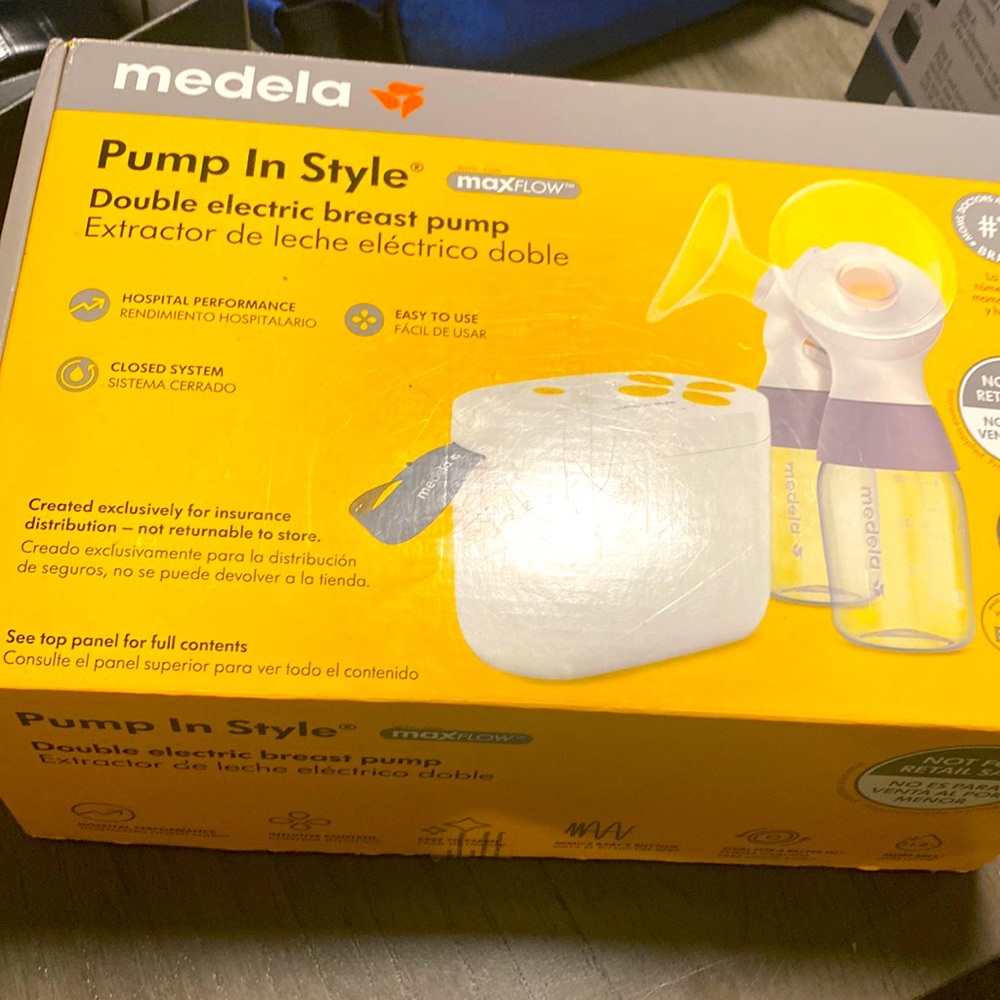 Brand new in box never used Medela breast pump.